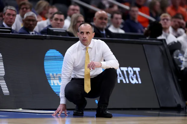 Iowa coach Ben McCollum watches from the sideline against Nebraska during the first half of the Sweet Sixteen game Thursday, March 26, 2026, in Houston. The Hawkeyes won 77-71. (Kenneth Richmond/Getty)