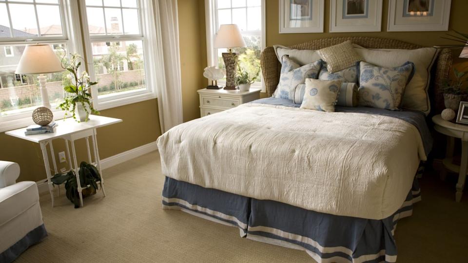 A luxurious house with a beautiful bedroom and modern decor.