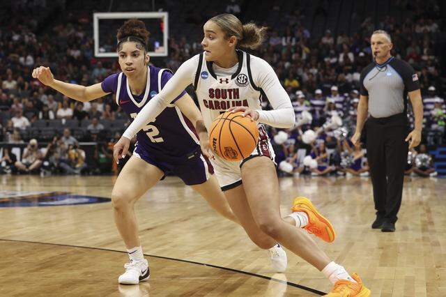 South Carolina's Tessa Johnson (5) drives around TCU’s Veronica Sheffey (2) during the second half of action of their Elite Eight women's basketball game against TCU at Golden 1 Arena on Monday, March 30, 2026.