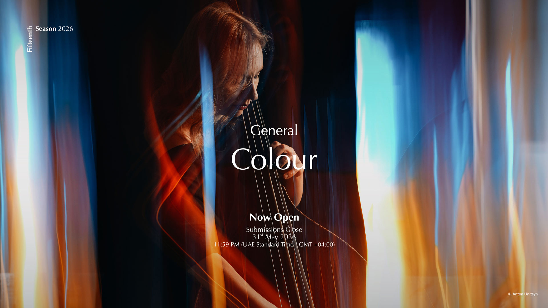 A woman playing the cello on a background of bright, dim lights in blue, orange and red colors. Cover text: "Color Summary, Now Open, Bids Close May 31, 2024 at 11:59 PM"