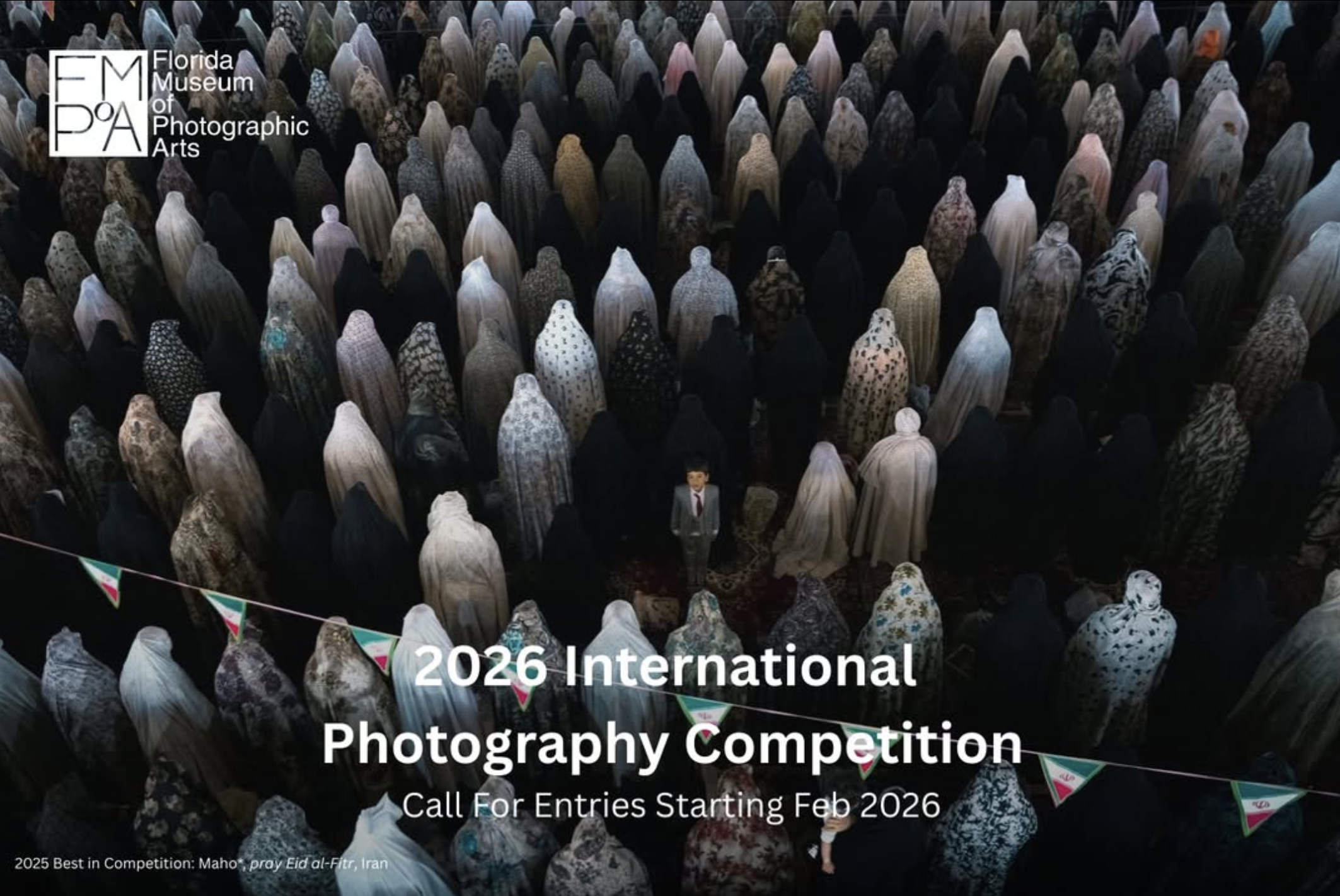 Aerial view of a large crowd of people in various costumes, gathered for a prayer event, with competition details overlaid.