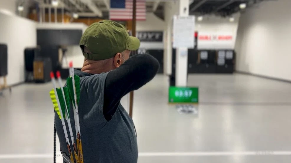 Doug Graham competing in the Virginia Bowhunters Association State Indoor Championships recently in Leesburg, VA. (Photo by Jay Korff/7News){}{p}{/p}
