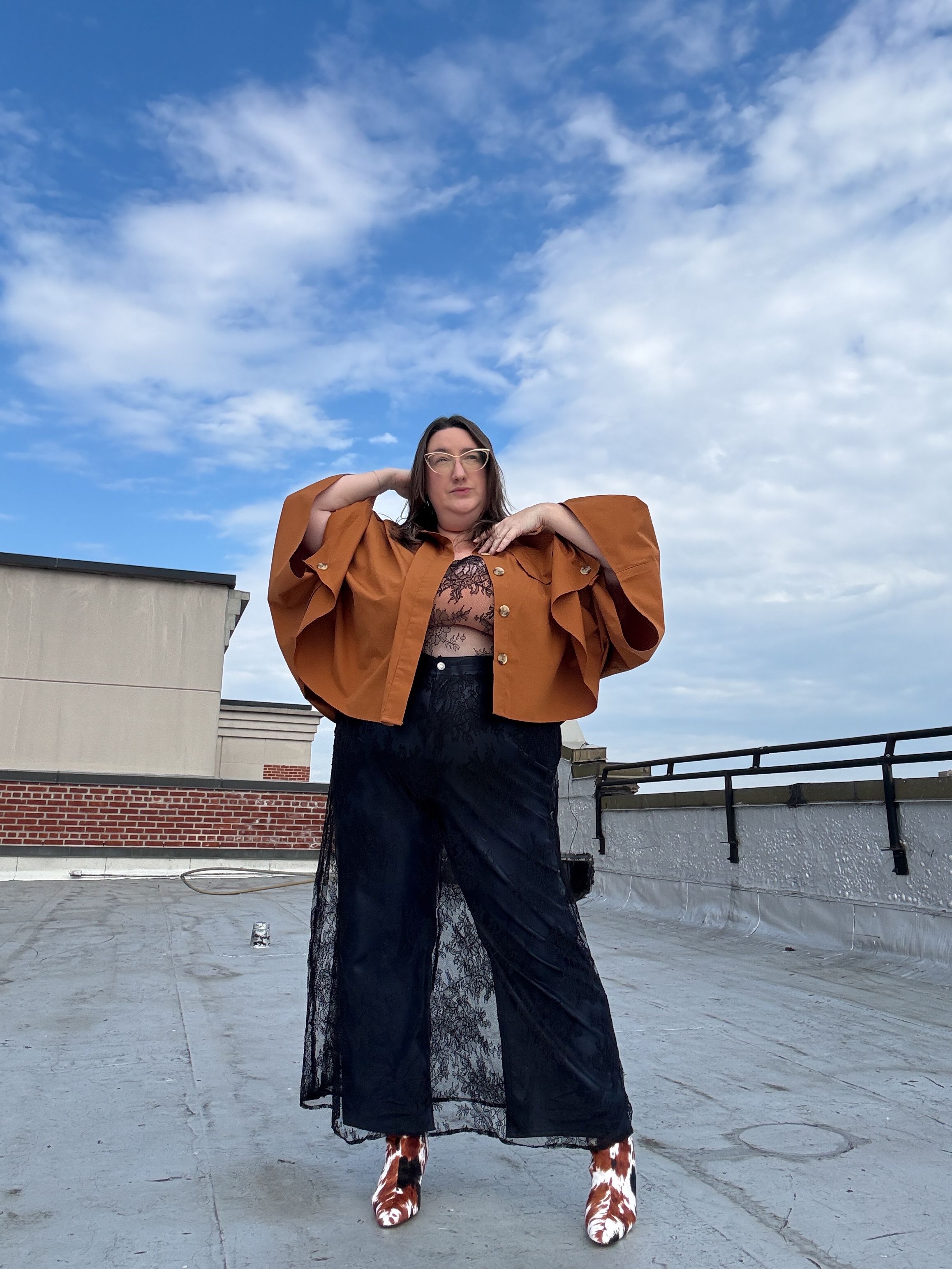 Sarah Chiwaya poses in leather, lace and animal print style