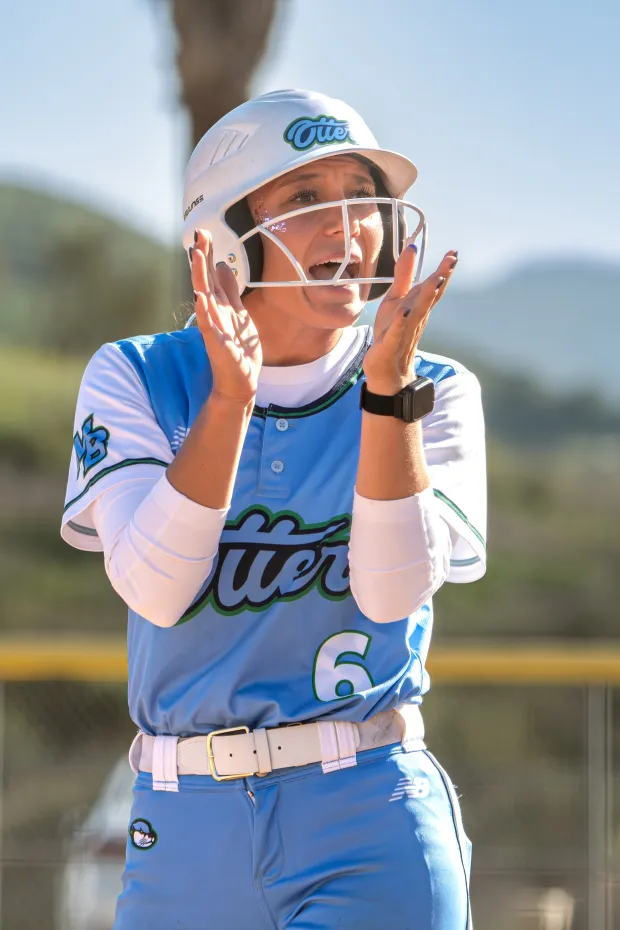 CSU Monterey Bay is great. Player Ellie Escalante, a Soquel High alumna, cheers on the nationally ranked Otters. (Photo by Jeff Kettering)