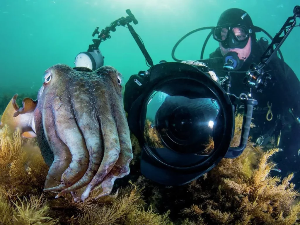 Brett close-up with cuttlefish - photo by Brett Lobwein